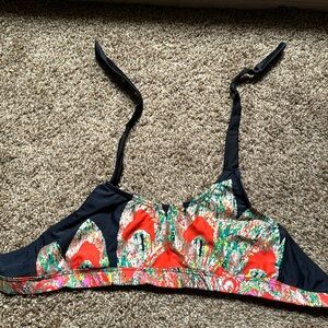 Gold/orange print with black swimsuit top